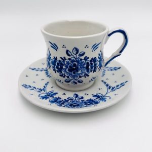 Cup and saucer with traditional flowers